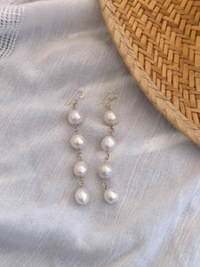String of south sea white pearl earrings
